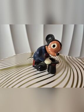 Mickey Mouse nodder or bobblehead toy, often attributed to the Marx brand